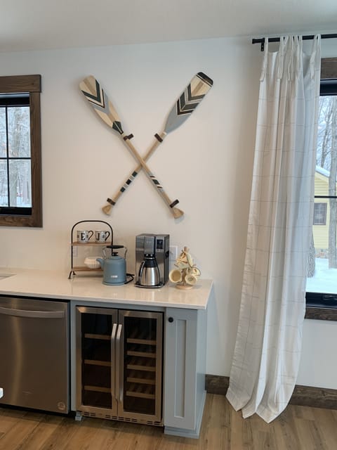 Beverage center for coffee and tea with fridge for cold drinks. 