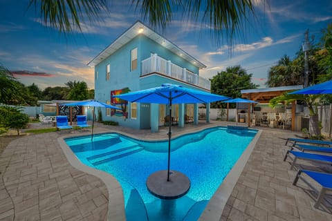 Resort Style Private Pool . Wading area at left and "in pool" concrete table and bench front 