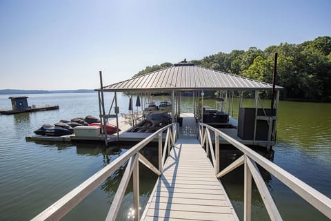 Dock + on-site pontoon & jet ski rentals—lake days start here (seasonal/add’l fee)