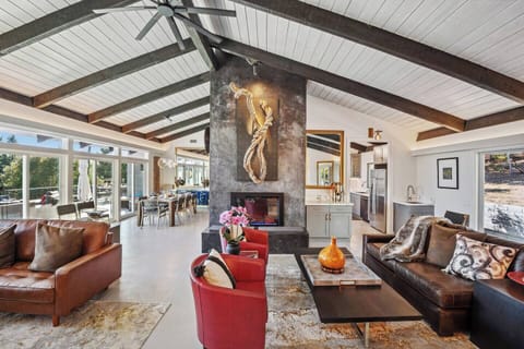 Open-concept great room combing living, entertainment, dining and kitchen  together effortlessly