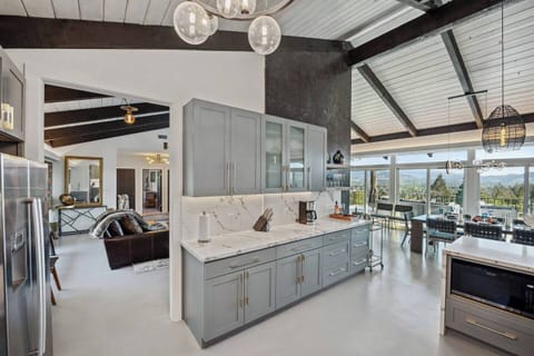 Flow of the kitchen into the dining room, as well as the family sitting area