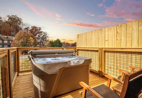 Soak up the sunset hues from the hot tub on your private deck, a relaxing end to any day spent exploring.