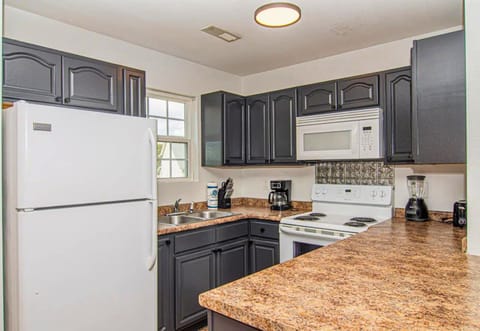 Craft your favorite dishes in our kitchen, complete with modern appliances and plenty of counter space for your culinary adventures.