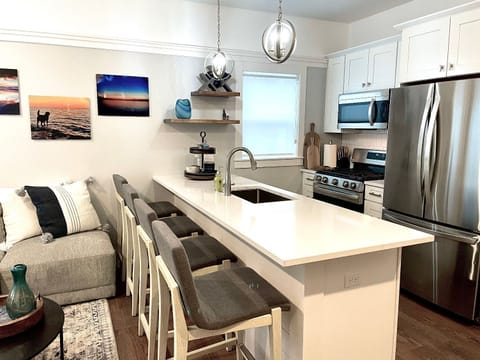 Kitchen with Gas Stove/oven Microwave full size Fridge/freezer