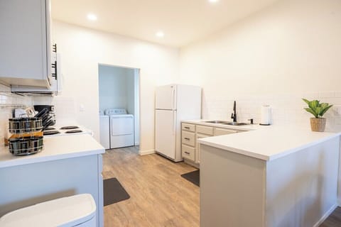 The living room opens up into our large kitchen with plenty of counter space