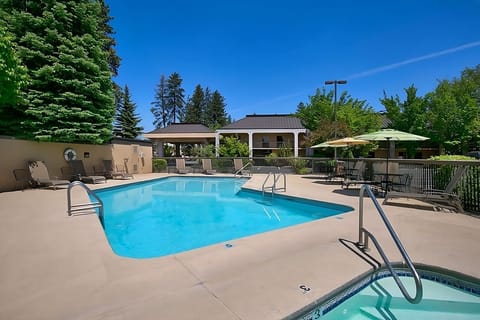 Dive into sunlit waters and lounge under shady umbrellas.