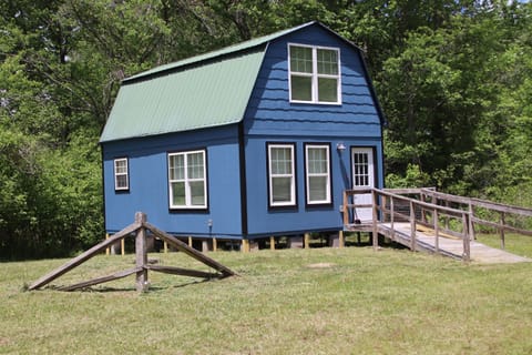 Chicory cabin, with access ramp and open parking.