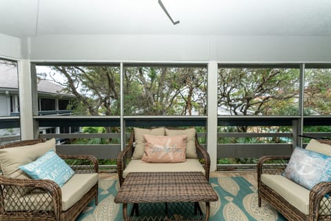 Screened in veranda. Each bedroom has access as well as living area.