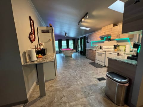 Kitchen with view of pool table