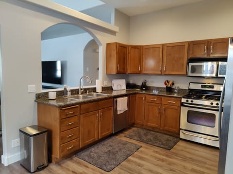 Gas stove, microwave and brand new dish washer.