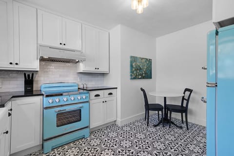 The dining room then leads into the full kitchen