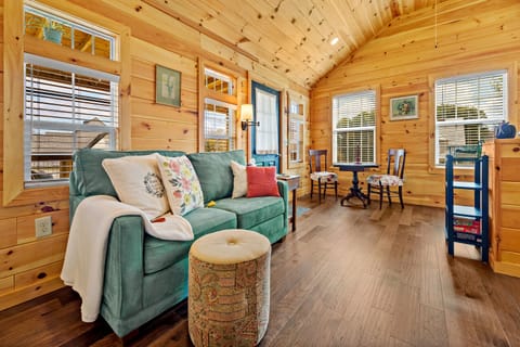 Spacious room featuring a Lazy-Boy love seat (full-size sleeper).