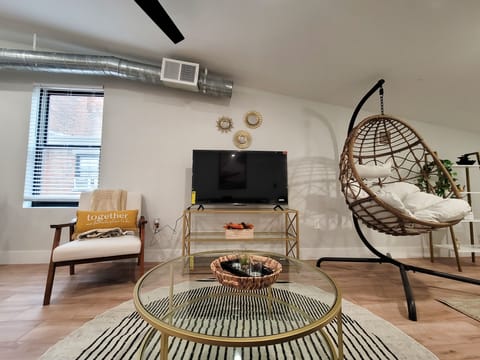 Stream a movie on the smart TV or read a book in the cozy hanging pod chair.