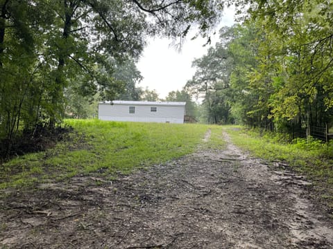 standing on Private boat ramp looking at back of home- 