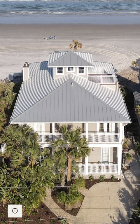 House is directly on the beach with private walkway. 