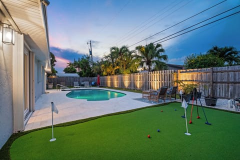 Experience the ultimate oasis: enjoy a 4-hole mini golf course and heated pool