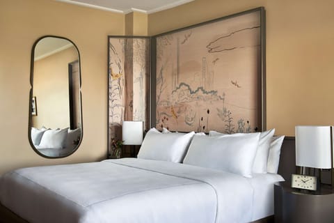 Relax beside soft lighting and artful details for a restful night.