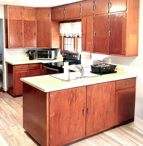 Kitchen- double stove, microwave, 2 slot toaster