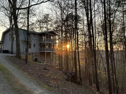 Driveway approaching the cabin at sunset in the spring.
