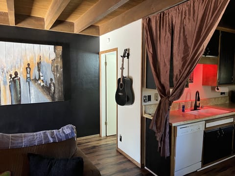 Corner view of kitchen and entrance to the bathroom 