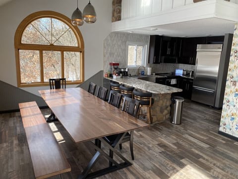 Chef's kitchen with 10' custom walnut table