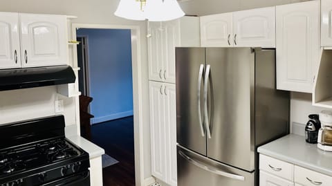 Kitchen (currently updated (not in pictures) with a brand new gas stove/oven