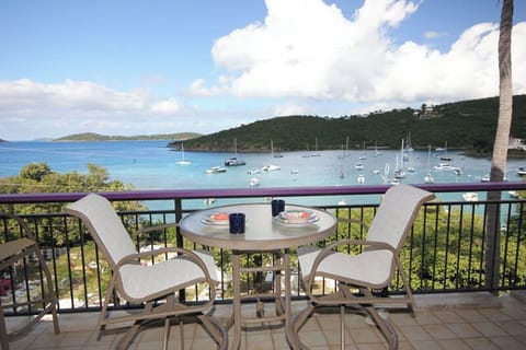 Your view from Windcatcher includes Cruz Bay, fiery sunsets, and St Thomas