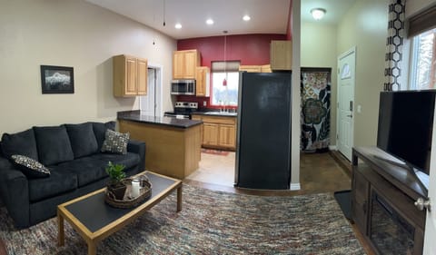 Living room, kitchen and entry