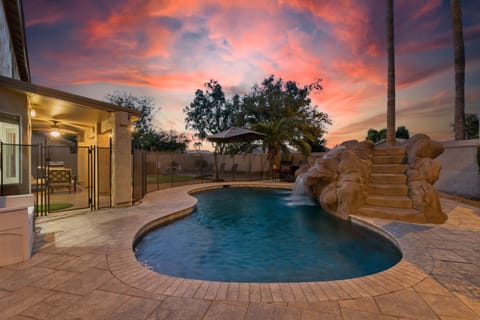 Backyard with fully fenced pool