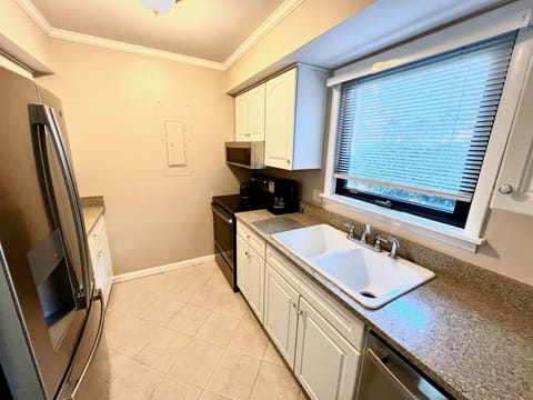A well stocked galley kitchen makes preparing meals easy.