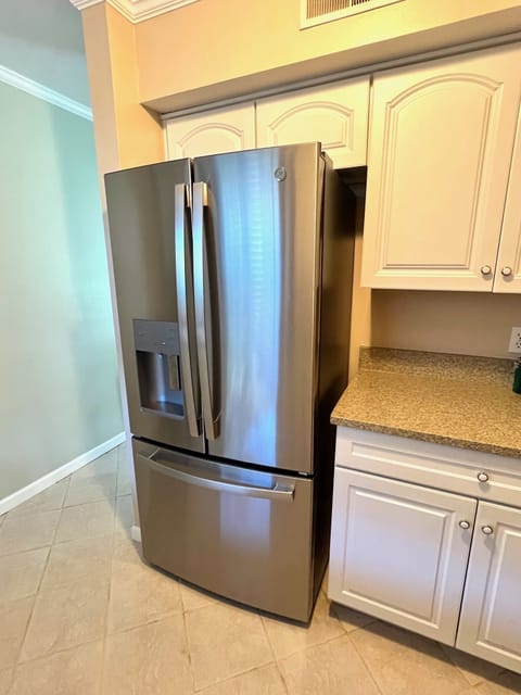The kitchen features sleek Stainless Steel Appliances.