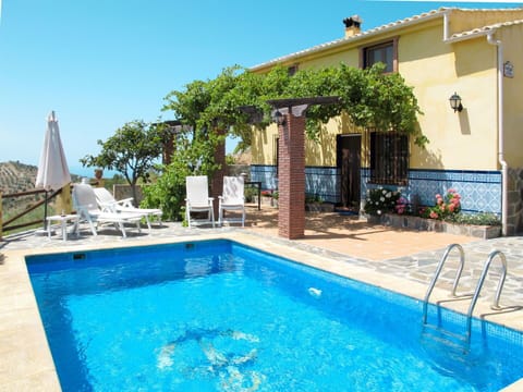 Water, Plant, Sky, Building, Property, Swimming Pool, Azure, Blue, Chair, Outdoor Furniture