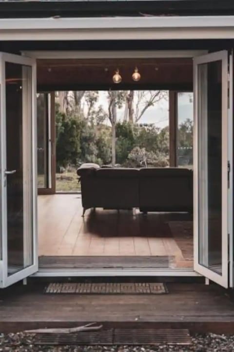 Front door view to open plan living room.