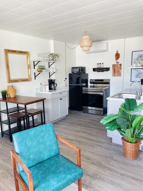 Looking into the kitchen area from living room area.