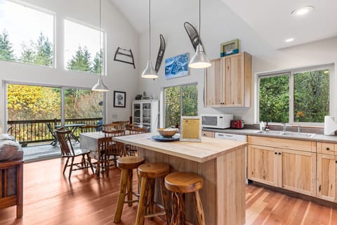 Down the hall from the entryway and to the left is the great room