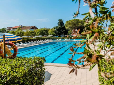 Water, Plant, Sky, Swimming Pool, Azure, Tree, Outdoor Furniture, Leisure, Shade, Building