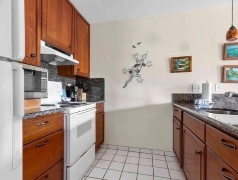 Cook easy island meals in a bright, stocked kitchenette.