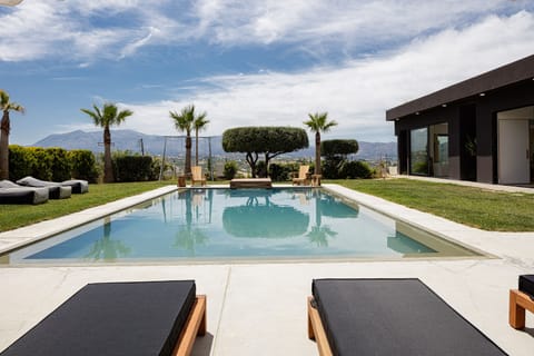 Featuring a 50m2 Private pool with captivating surroundings. 