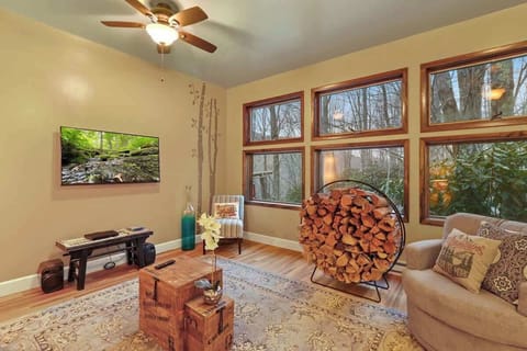 Cozy sophistication: A living room where firewood becomes a stylish accent, seamlessly organized to add warmth and character to the space
