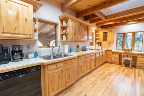 There is lots of beautiful wood in the kitchen