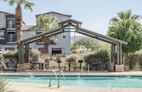Gated Community Pool
With grills
tables and chairs
loungers 
outdoor showers