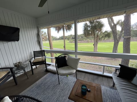 Screened in porch overlooking the 4th tee box