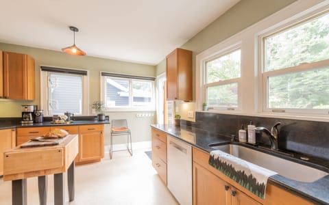 Fully equipped chefs kitchen, complete with stainless steel appliances. 