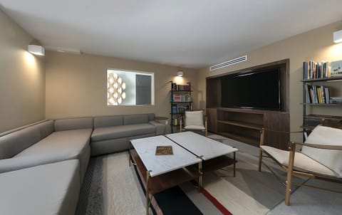 Living Room. Exact unit will be assigned upon arrival. Views, colors, and decor may vary.