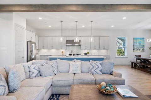 Open concept family room, kitchen, and dining room.