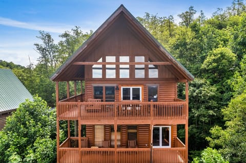 Nestled in the mountainside, enjoy infinite VIEWS from main-level or lower-level decks!