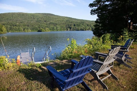 Adirondack chairs by the lake