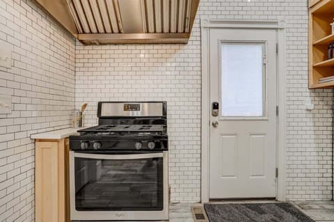 Step Out to Fresh Air from Our Kitchen, Equipped with a Smart Lock for Easy Entry!