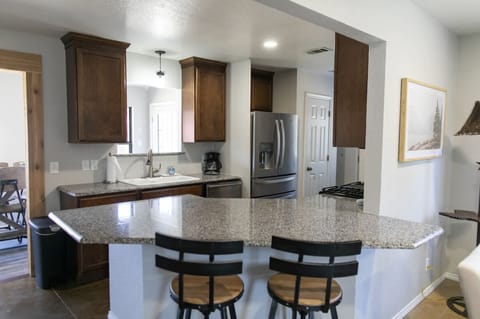 The kitchen is a great size for prepping & cooking, has a bar area for seating.