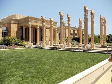 Arrive in style to striking architecture and manicured lawns.